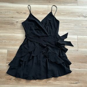 Francesca’s NWT black ruffle mini dress with adjustable straps and waist tie